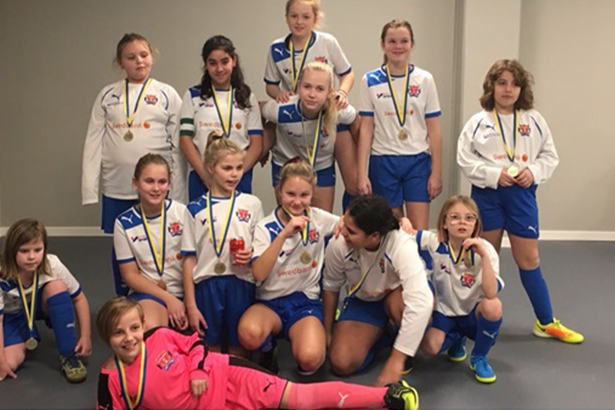 Lagbild med medaljer från Åstorps FF